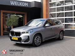 BMW iX1 - eDrive20 67 kWh | M-Pakket | NL-Auto | Innovation Pack | Individual Frozen Pure Grey |
