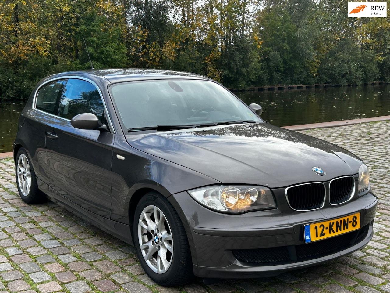 BMW 1-serie - 118i High Executive Zeer netjes airco elektrische ramen cv op afs - AutoWereld.nl
