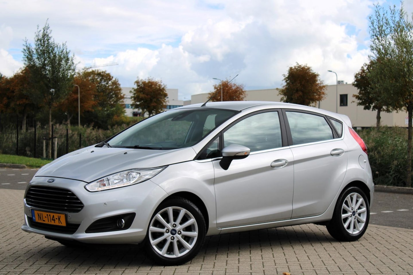 Ford Fiesta - 1.0 EcoBoost Titanium l Airco l Navi l Cruise - AutoWereld.nl