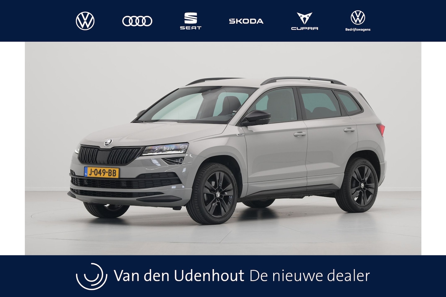 Skoda Karoq - 1.5 TSI ACT 150pk DSG Sportline Business Navigatie CantonSound Stoelverwarming Camera Carp - AutoWereld.nl