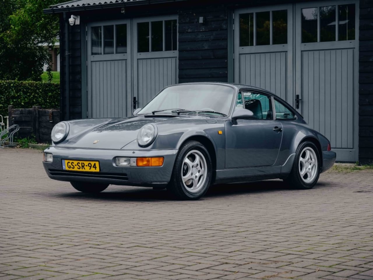 Porsche 911 - Porsche 964 coupe Venetian Blue - AutoWereld.nl