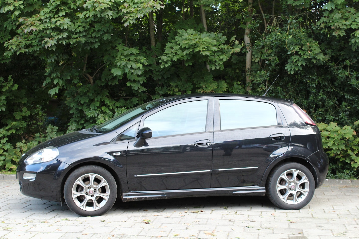 Fiat Punto Evo - 0.9 TwinAir Street airco cruise parkeersensoren 2e eigenaar - AutoWereld.nl