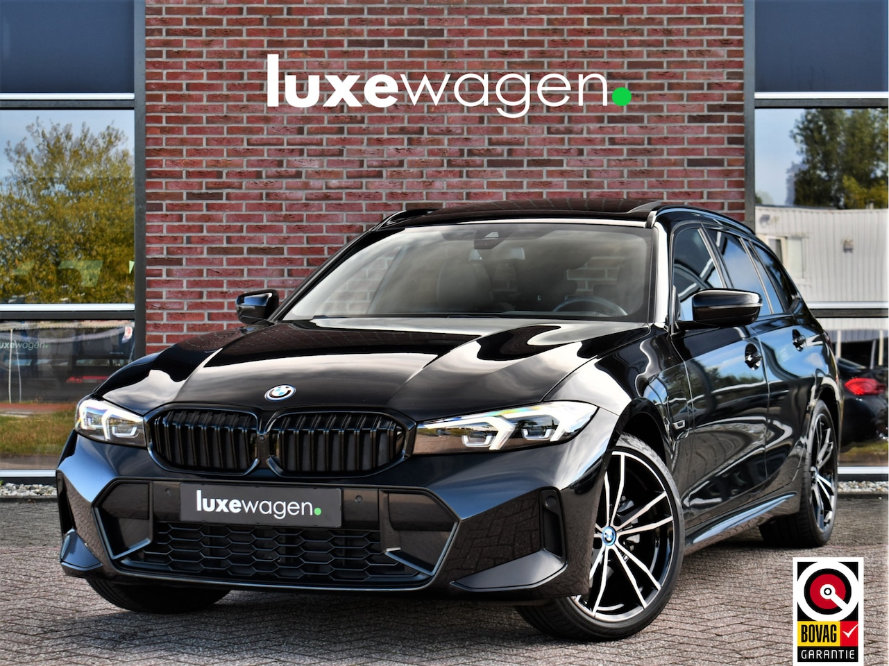 BMW 3-serie Touring - 320e M-Sport Pano El-zetels 360-cam HUD 19inch - AutoWereld.nl