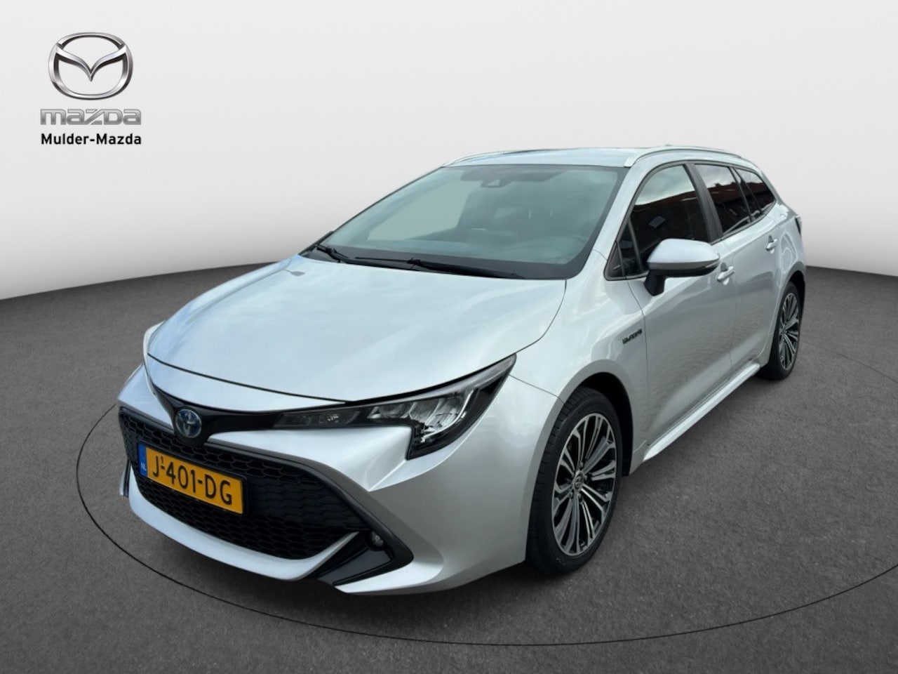 Toyota Corolla Touring Sports - 2.0 Hybrid Business Plus [ Carplay Stoelverwarming Camera ] - AutoWereld.nl