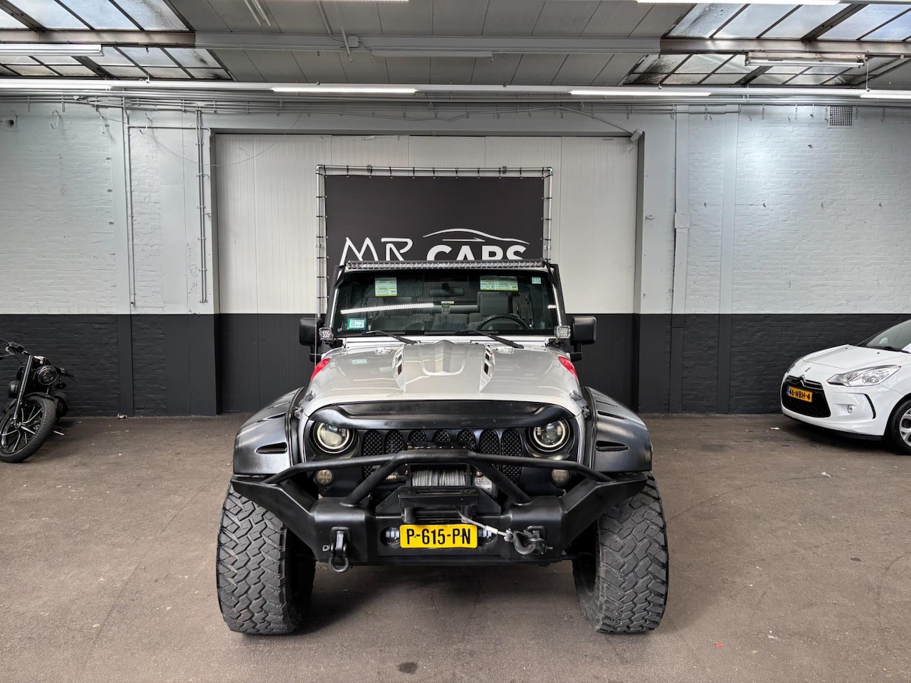 Jeep Wrangler Unlimited - 3.8 Sahara Automaat Cabrio - AutoWereld.nl