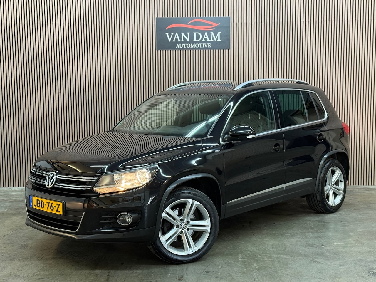 Volkswagen Tiguan - 2.0 TSI Sport&Style 4Motion 2013 DSG NAVI CLIMA - AutoWereld.nl