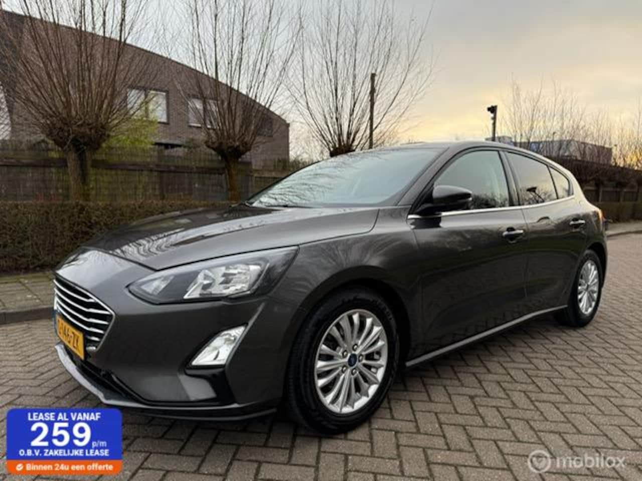 Ford Focus - 1.0 EcoBoost Titanium Business 1.0 EcoBoost Titanium Business - AutoWereld.nl