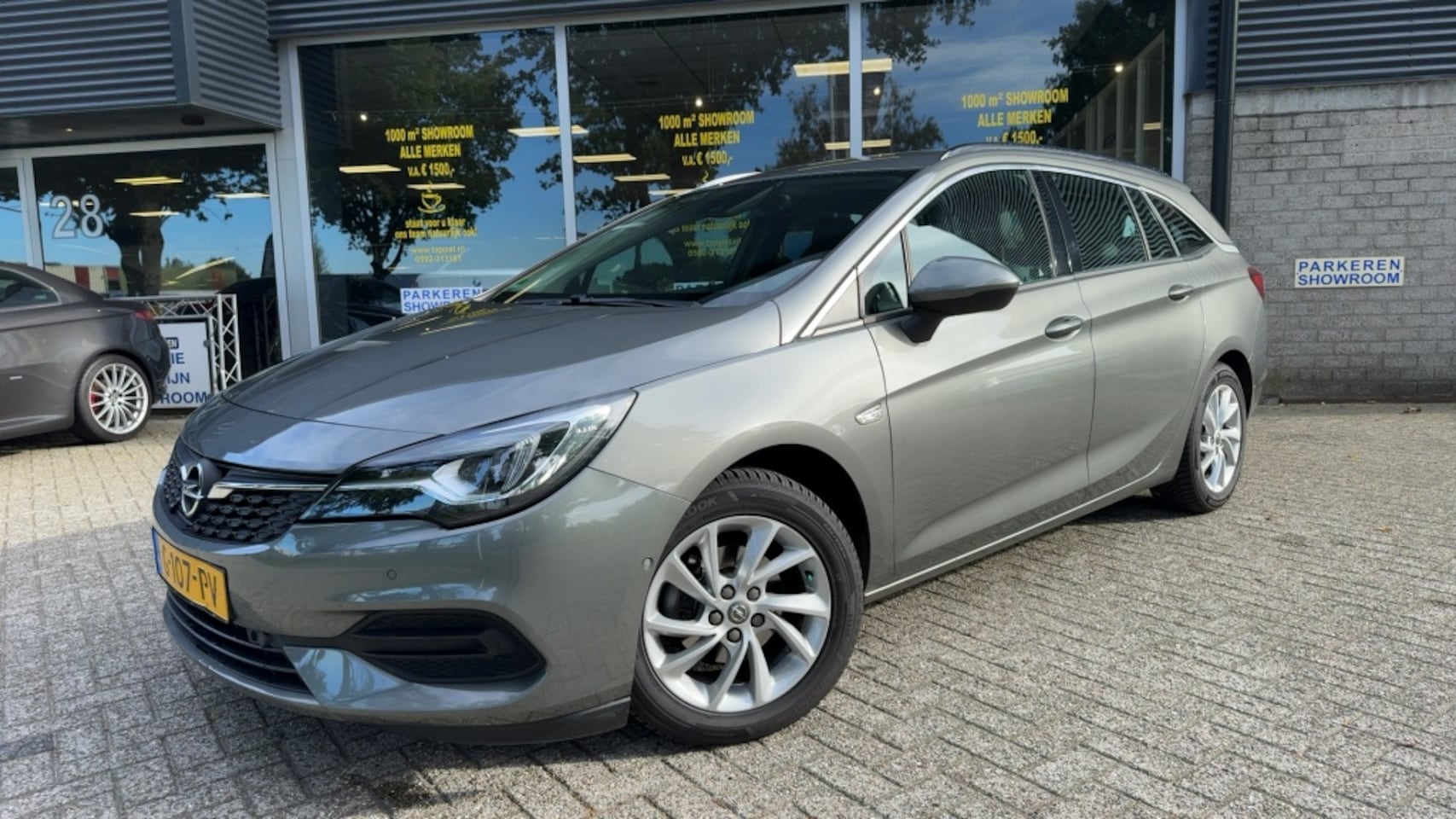 Opel Astra Sports Tourer - 1.2 Elegance 1.2 Elegance - AutoWereld.nl