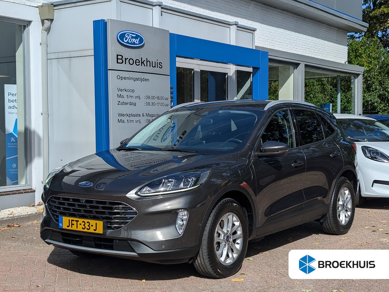Ford Kuga - 2.5 PHEV Titanium 225pk | Winter Pack | Keyless | Adap. Cruise | Navi | Carplay | Dealeron - AutoWereld.nl