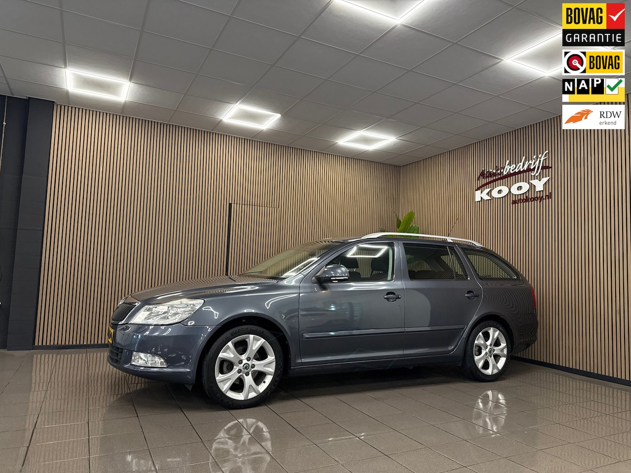 Skoda Octavia Combi - 1.2 TSI Elegance Business Line * Automaat / Trekhaak / Cruise control / NL Auto * - AutoWereld.nl