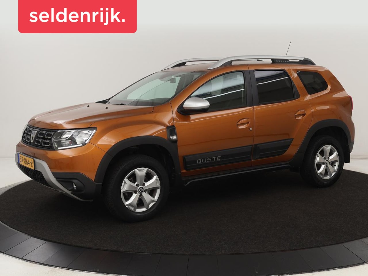 Dacia Duster - 1.2 TCe Comfort | Trekhaak | Navigatie | Camera | Cruise control | Airco | Getint glas | D - AutoWereld.nl