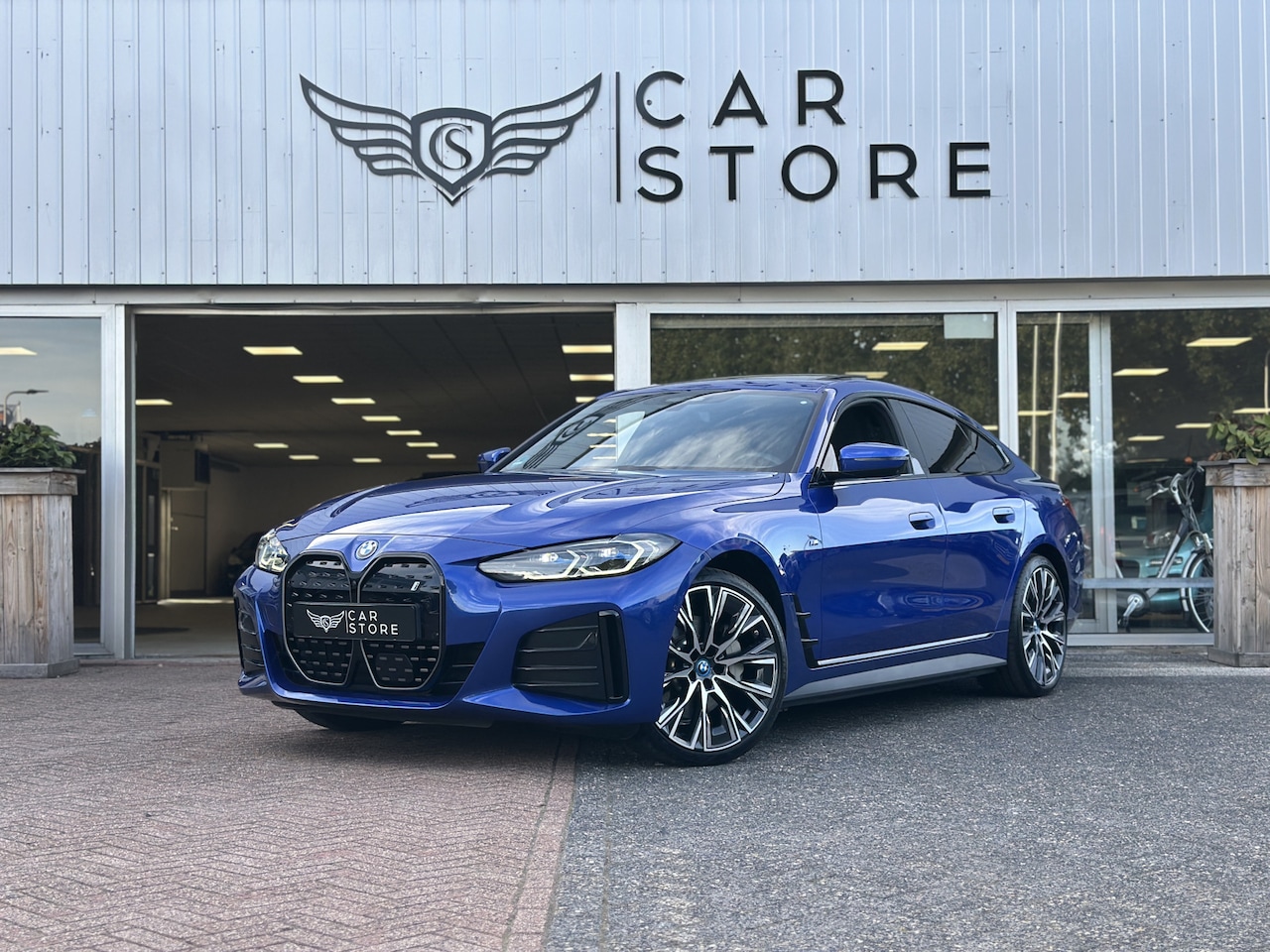 BMW i4 - eDrive35 M Sport Edition 70 kWh |PANO|360CAMERA|MEMORY|LASER|H&K|CARPLAY|TREKHAAK|HUD - AutoWereld.nl