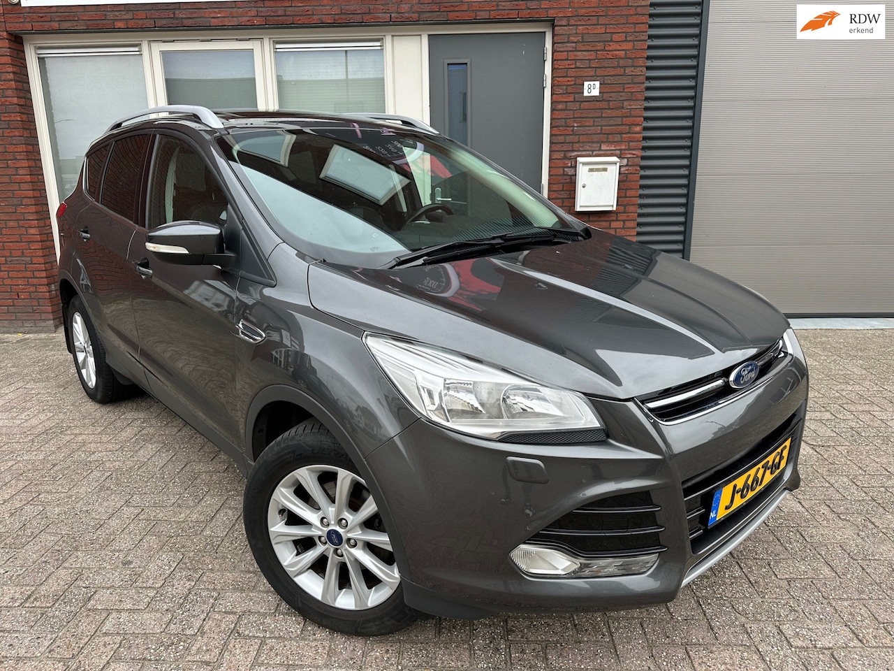 Ford Kuga - 1.5 Titanium / Schuifdak / Leder / Navi / PDC / - AutoWereld.nl