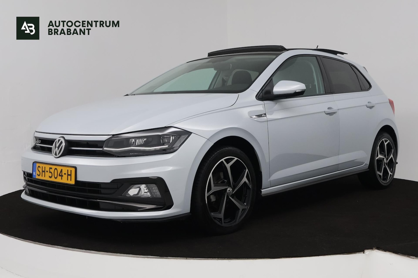 Volkswagen Polo - 1.0 TSI R-line (PANORAMADAK, NAVIGATIE, STUURBEDIENING, 1e EIGENAAR, GOED ONDERHOUDEN) - AutoWereld.nl