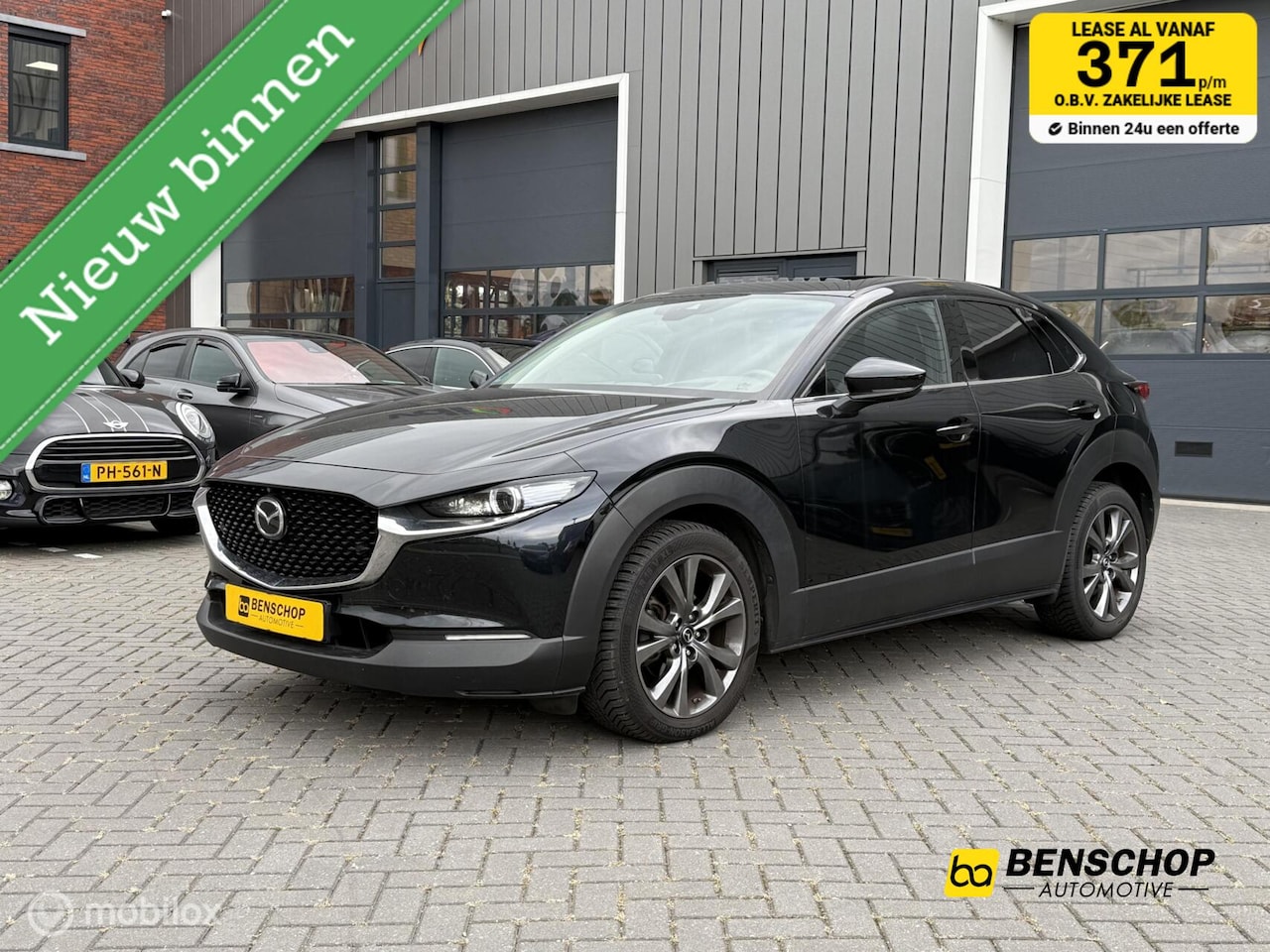 Mazda CX-30 - 2.0 e-SkyActiv-X AWD Luxury Schuifdak Leer Navi Carplay 360 Camera Bose - AutoWereld.nl
