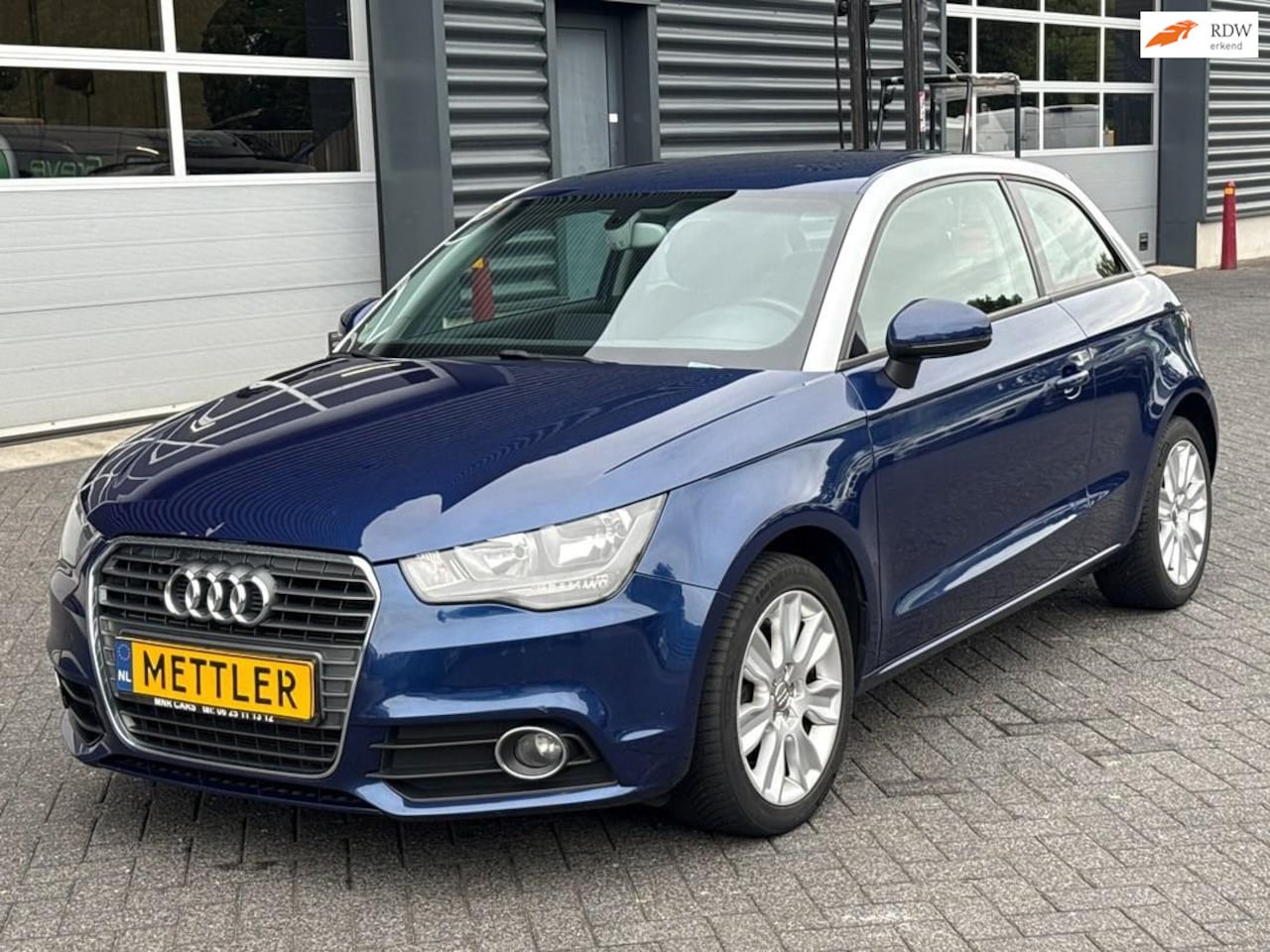 Audi A1 - 1.4 TFSI Attraction 1.4 TFSI Attraction, airco, cruise control, navigatie - AutoWereld.nl