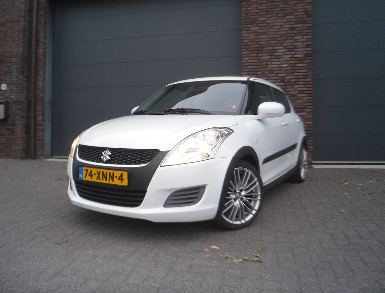 Suzuki Swift - 1.2 Summer EASSS Airco Achterspoiler - AutoWereld.nl