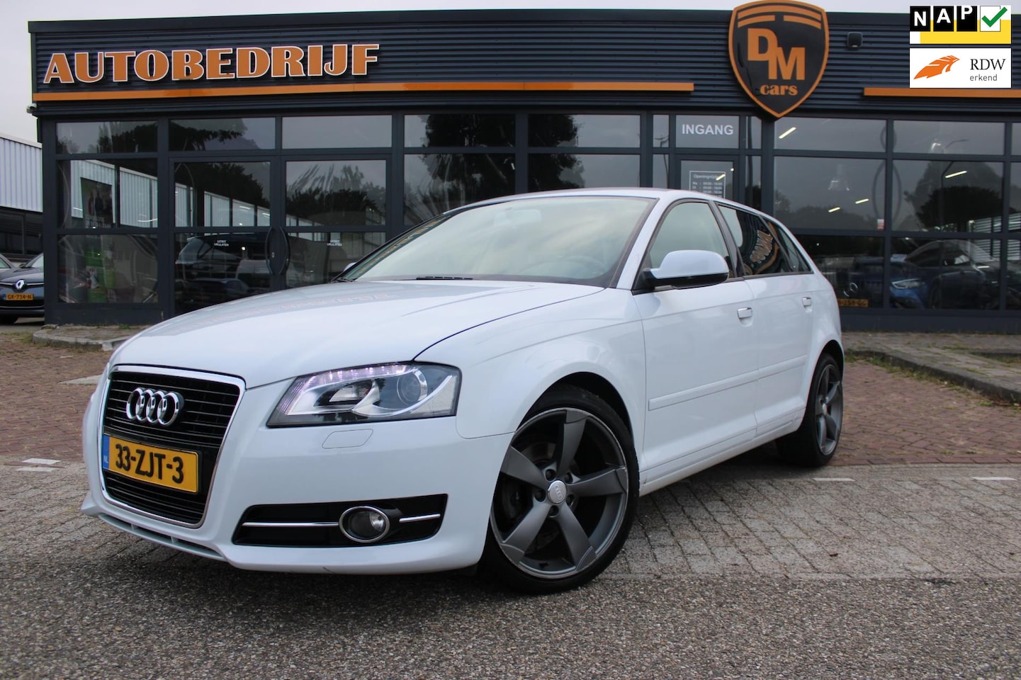 Audi A3 Sportback - 1.2 TFSI Attraction | Leer | Navi | Airco | - AutoWereld.nl