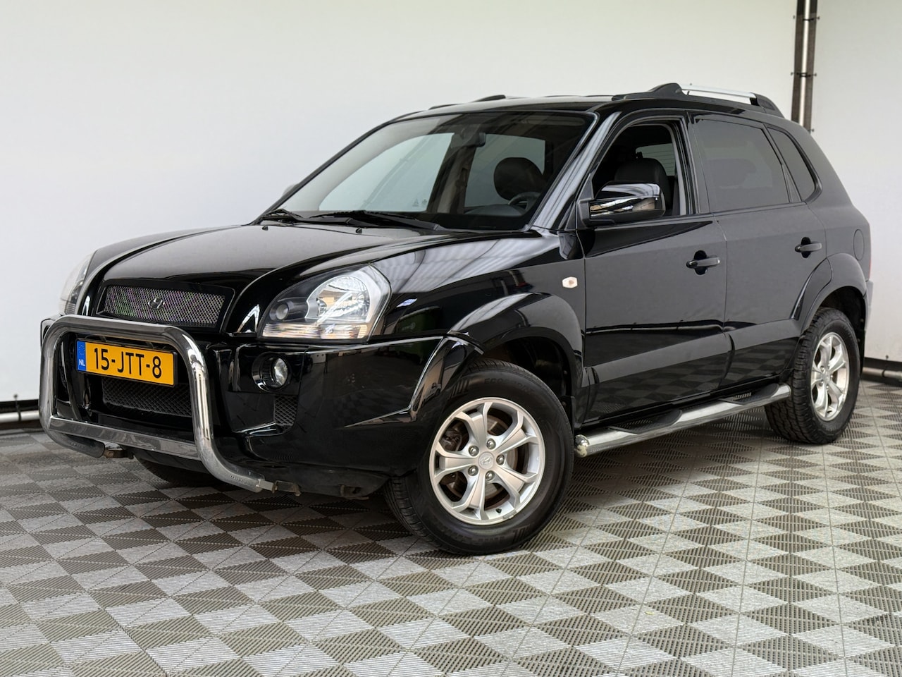 Hyundai Tucson - 2.0i Style Supreme Leer ECC Navi NL Auto - AutoWereld.nl
