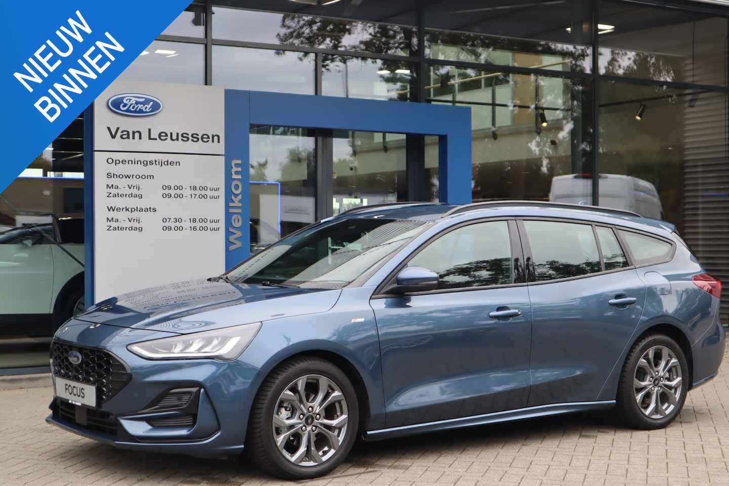 Ford Focus Wagon - 125PK HYBRID ST-LINE AUTOMAAT ANDROID/APPLE NAVI CAMERA P-SENSOREN 17" LM-VELGEN - AutoWereld.nl