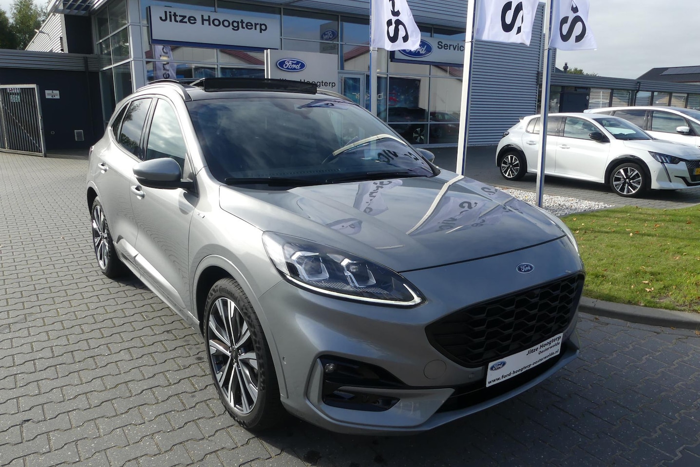 Ford Kuga - 1.5 EcoBoost ST-Line X PANO, HUD, B&O, WINTER PACK, ADAPT. CRUISE, CLIMA, ELEKT. STOEL/ACH - AutoWereld.nl