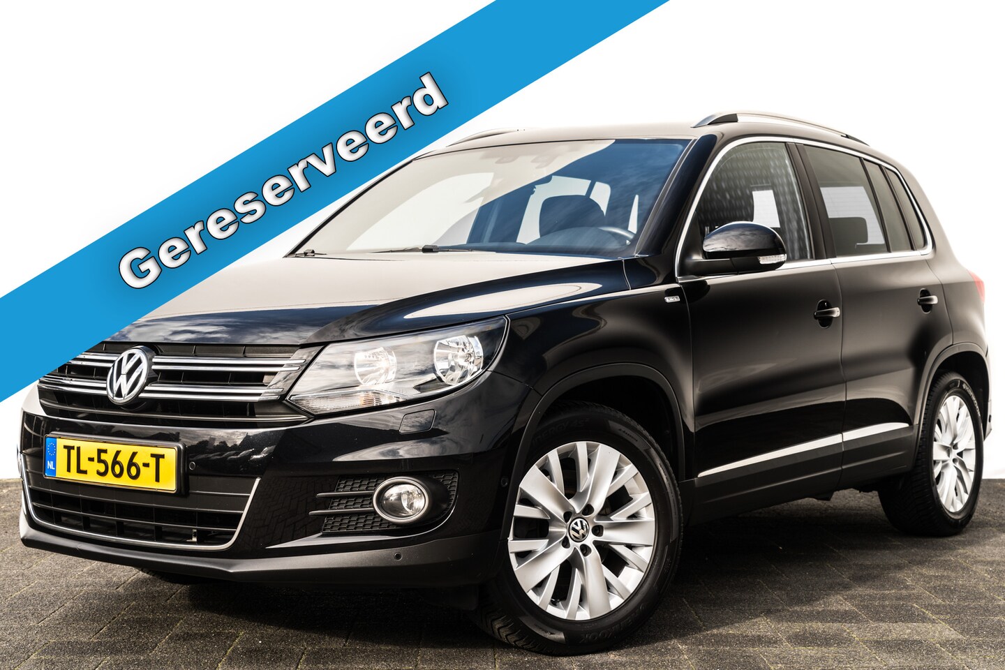 Volkswagen Tiguan - 1.4 TSi Life | Trekhaak | Stoelverwarming | PDC | Navi | 17 inch LMV - AutoWereld.nl