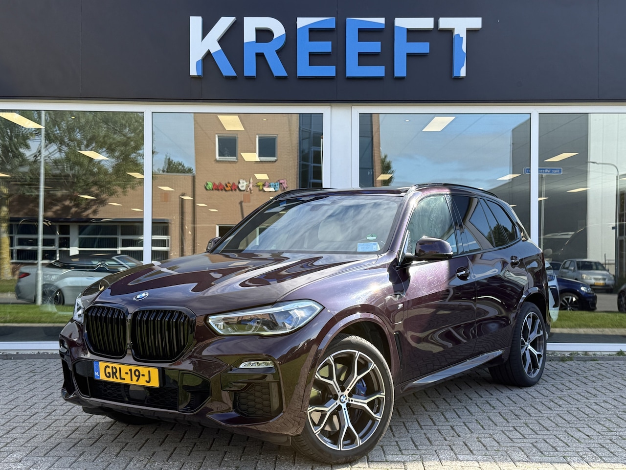 BMW X5 - xDrive45e High Executive Violet | M Sport | Lucht | Hud - AutoWereld.nl