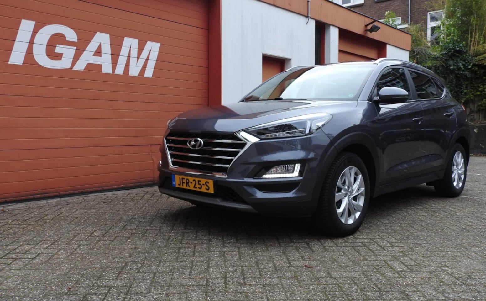 Hyundai Tucson - 1.6 T-GDI Comfort 1.6 T-GDI Comfort, luxe, AUTOM, trekhaak, CC, navi, camera - AutoWereld.nl