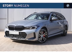 BMW 3-serie Touring - 330e High Executive M Sport Automaat / Panoramadak / Trekhaak / Sportstoelen / Comfort Acc