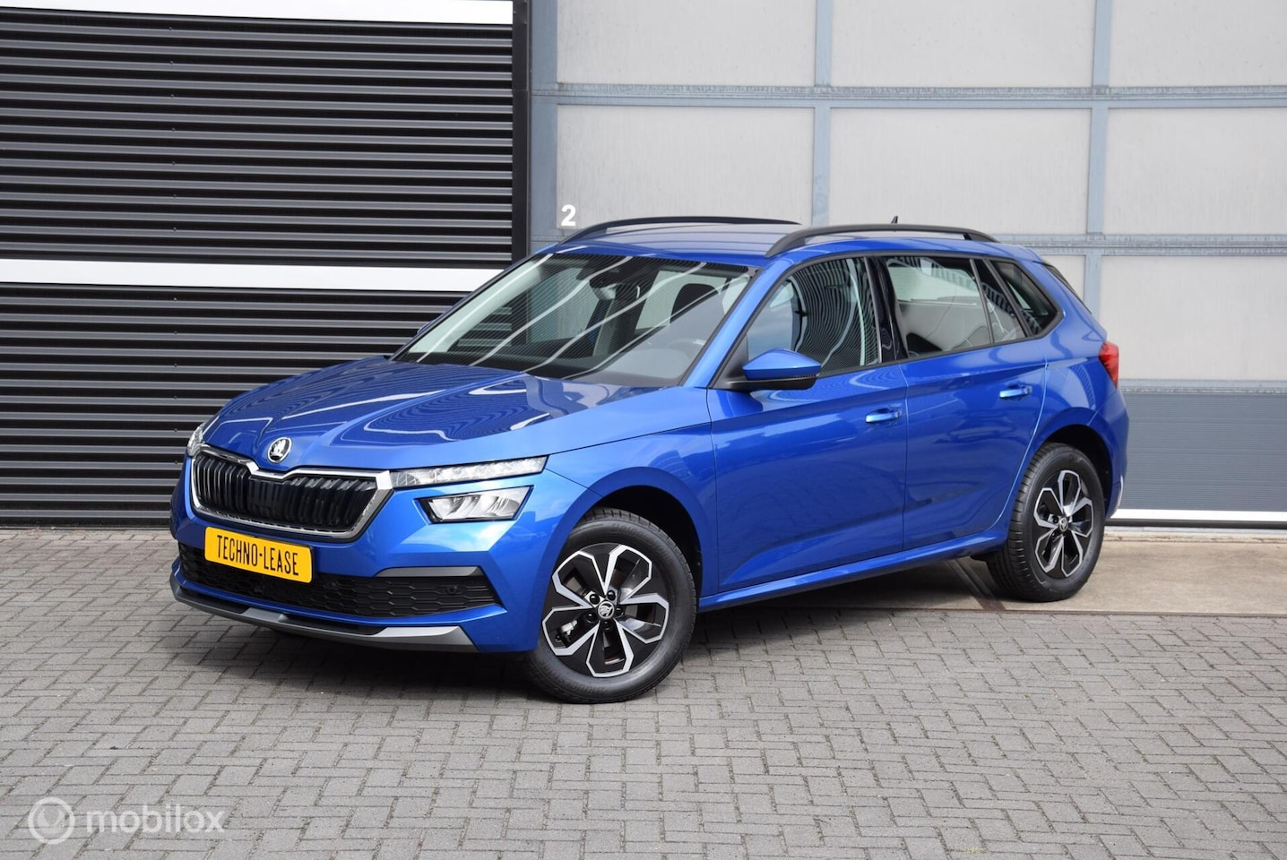 Skoda Kamiq - 1.0 TSI Sport Race blue Virtual cockpit Full LED Apple Carplay - AutoWereld.nl