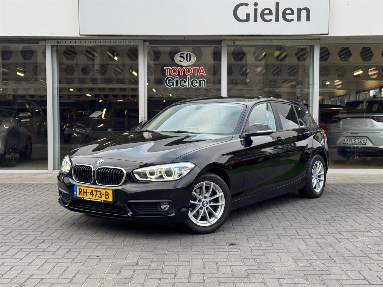 BMW 1-serie - (f20) 118i Automaat Corporate Lease High Executive | Navigatie, Leer, Stoelverwarming, LED - AutoWereld.nl
