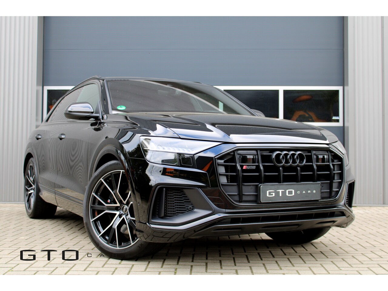 Audi Q8 - 4.0 TFSI SQ8 quattro Nachtzicht/Audi Exclusive/BTW/1e eigenaar/Carbon - AutoWereld.nl