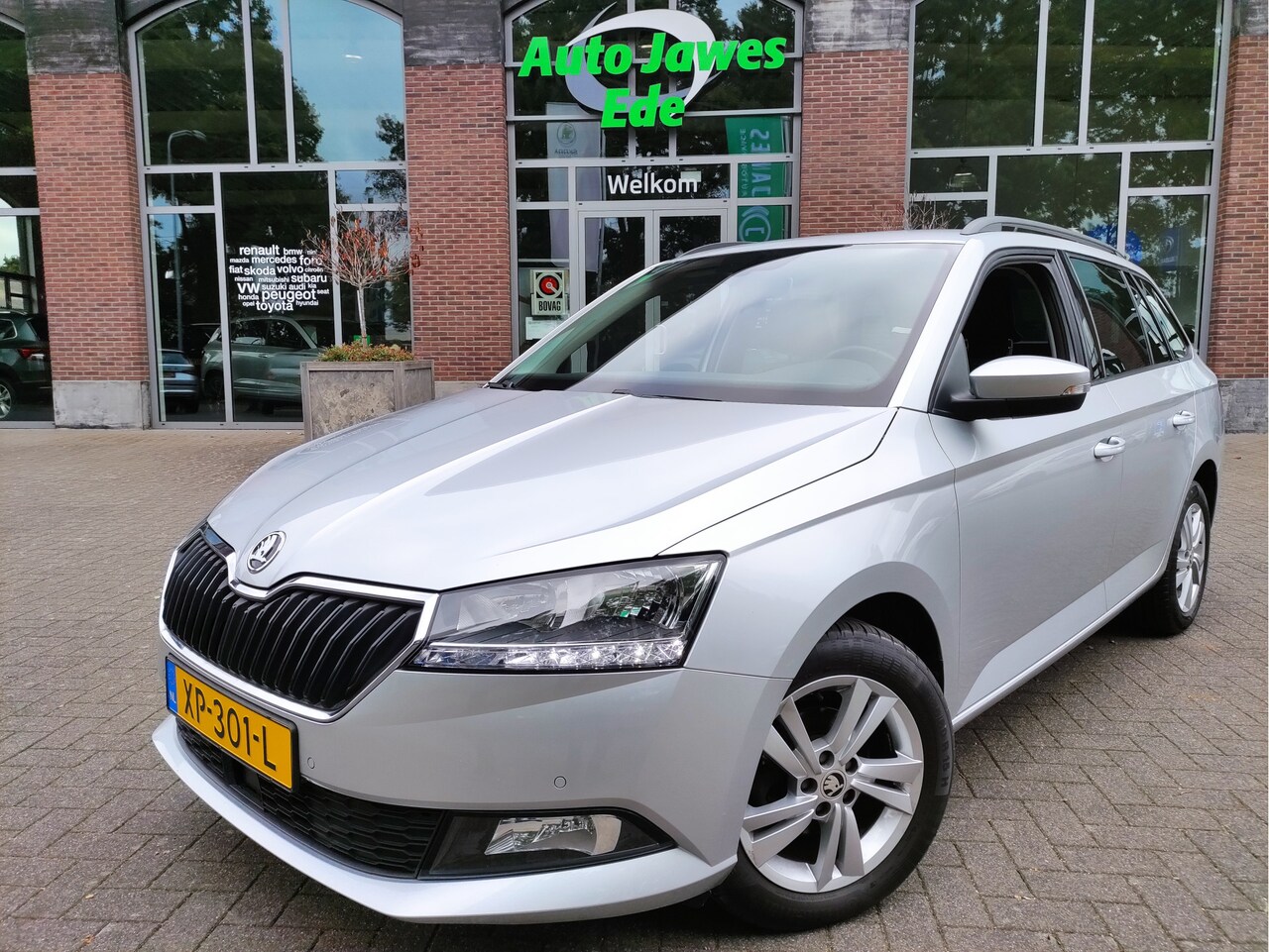 Skoda Fabia Combi - 1.0 TSI Style Parkeersensoren V+A - Climatronic - Navigatie - LMV - NL auto - AutoWereld.nl