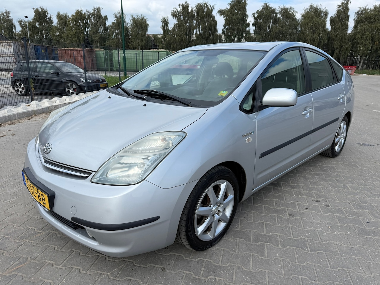Toyota Prius - 1.5 VVT-i Business Edition ORIGINEEL NL/NAVIGATIE/JBL SOUND TOT 310.000 DEALER ONDERHOUDEN - AutoWereld.nl