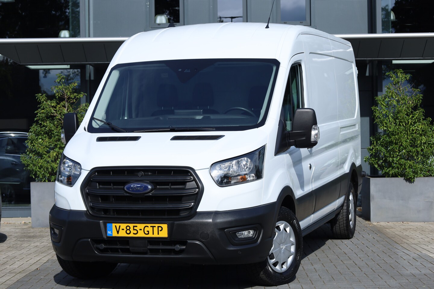 Ford Transit - 350 2.0 TDCI L3H2 Trend RWD | Leder | Navi | CarPlay | Trekhaak | Camera | Cruise | Stoelv - AutoWereld.nl