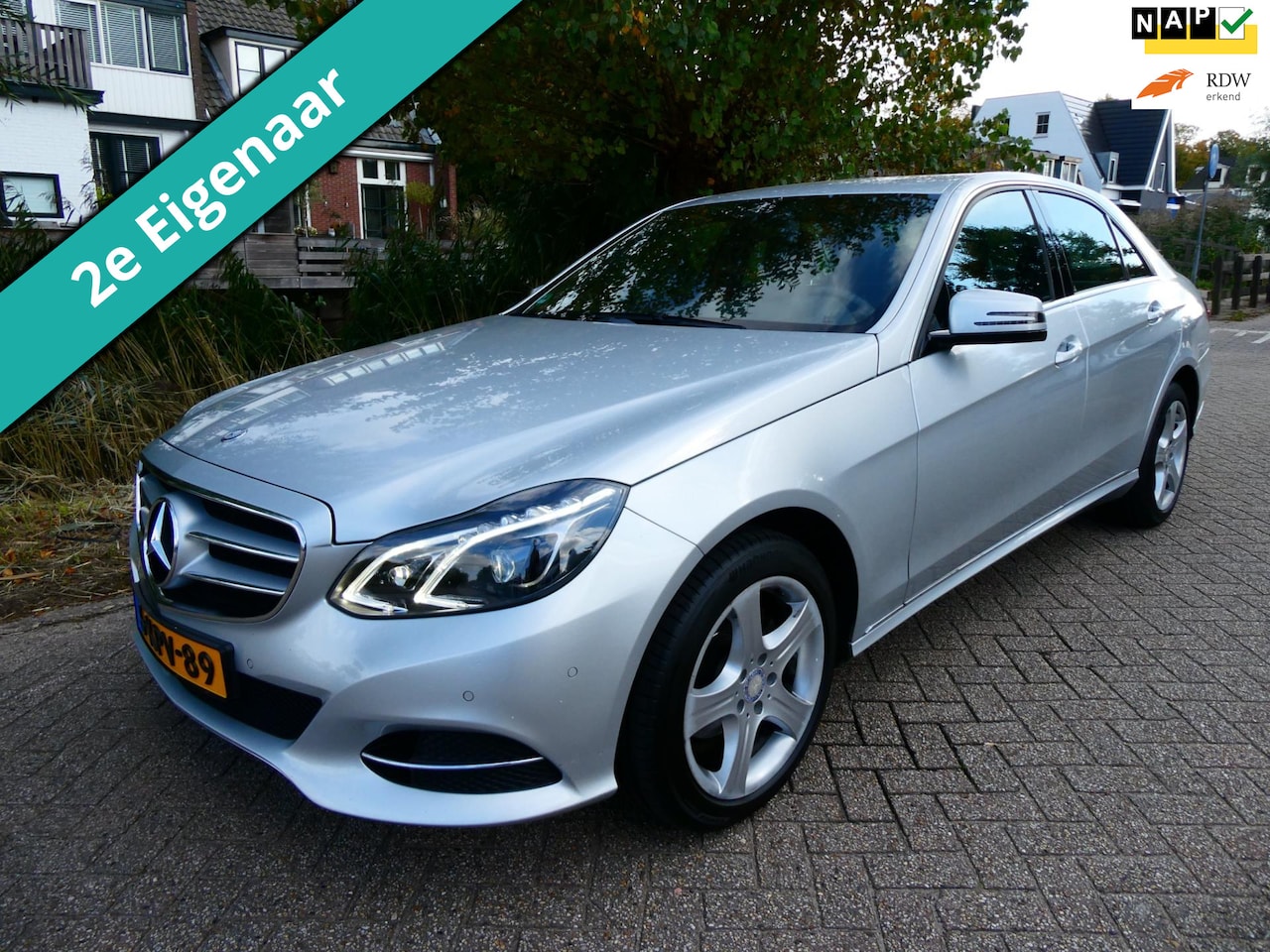 Mercedes-Benz E-klasse - 200 184pk Automaat 2e eig. Navi Xenon LED Trekhaak - AutoWereld.nl