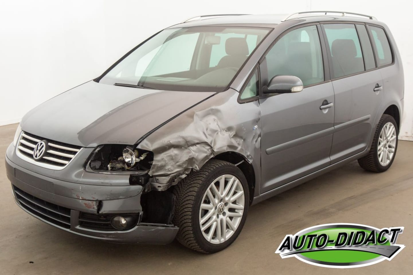 Volkswagen Touran - 1.9 TDI Automaat 7persoons Clima - AutoWereld.nl