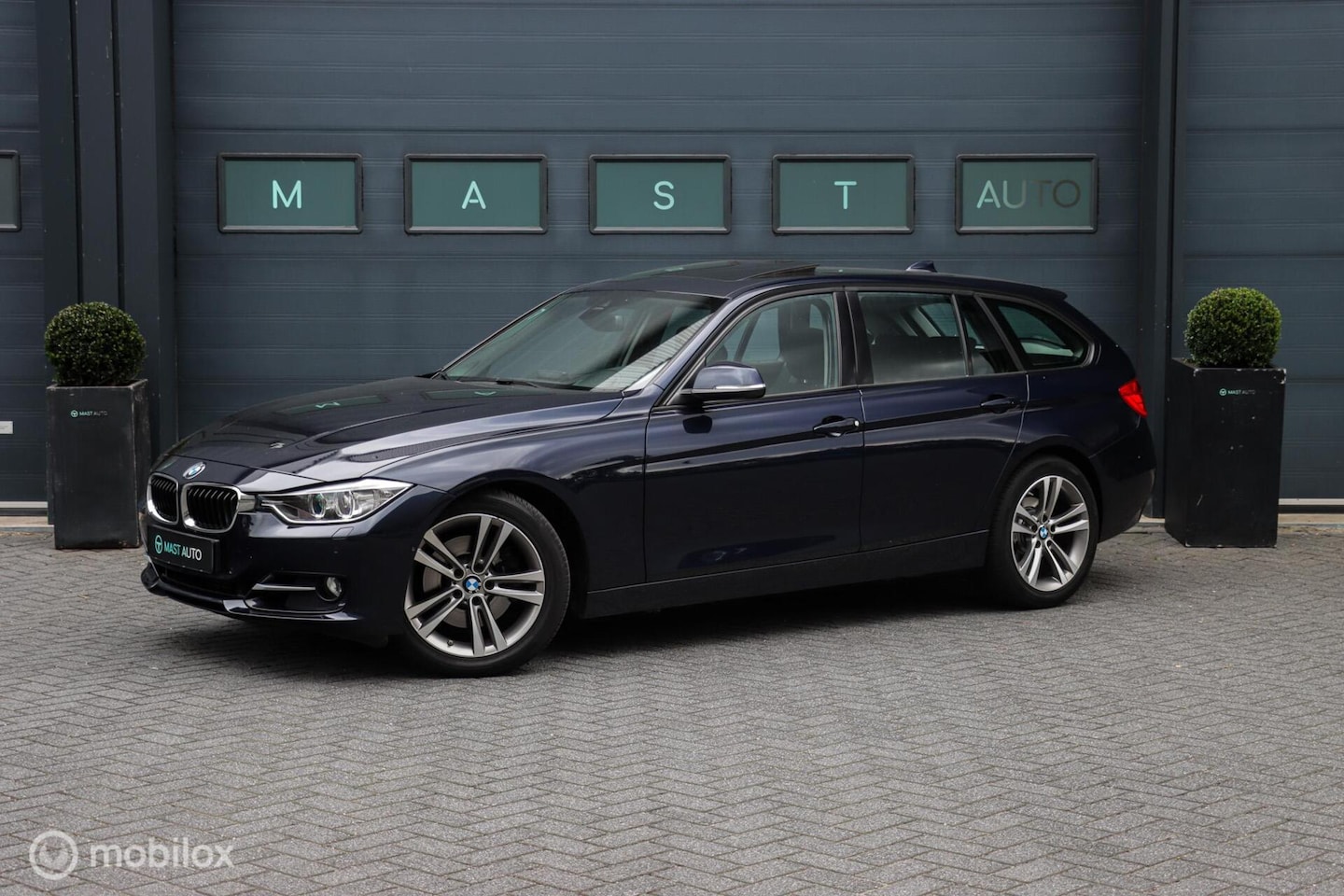 BMW 3-serie Touring - 328i xDrive | HUD | Pano | Harman-Kardon | PDC - AutoWereld.nl