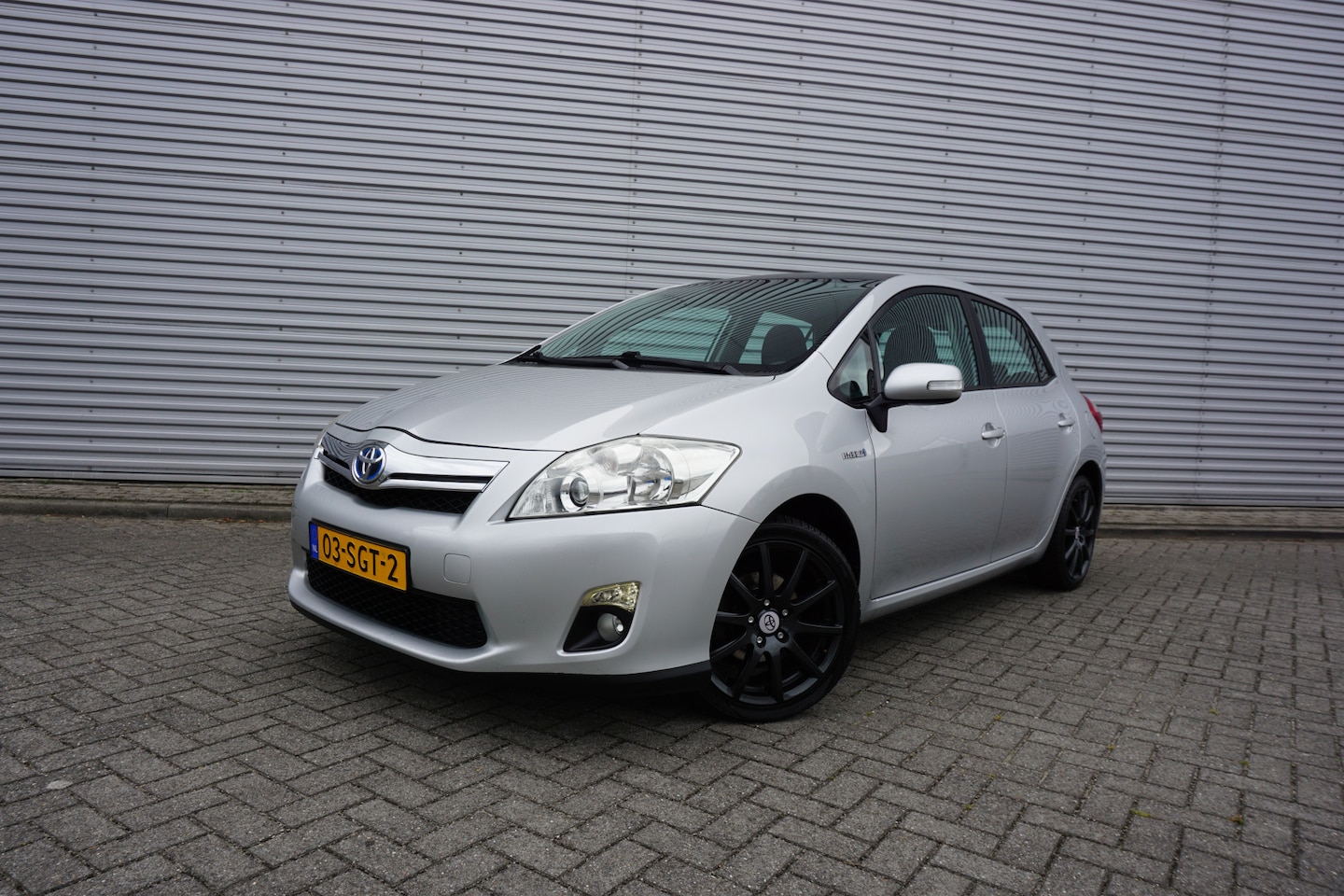 Toyota Auris - 1.8 Full Hybrid Aspiration AUTOMAAT - Airco / Navi / Cruise / Elektr. ramen / Lm velgen / - AutoWereld.nl