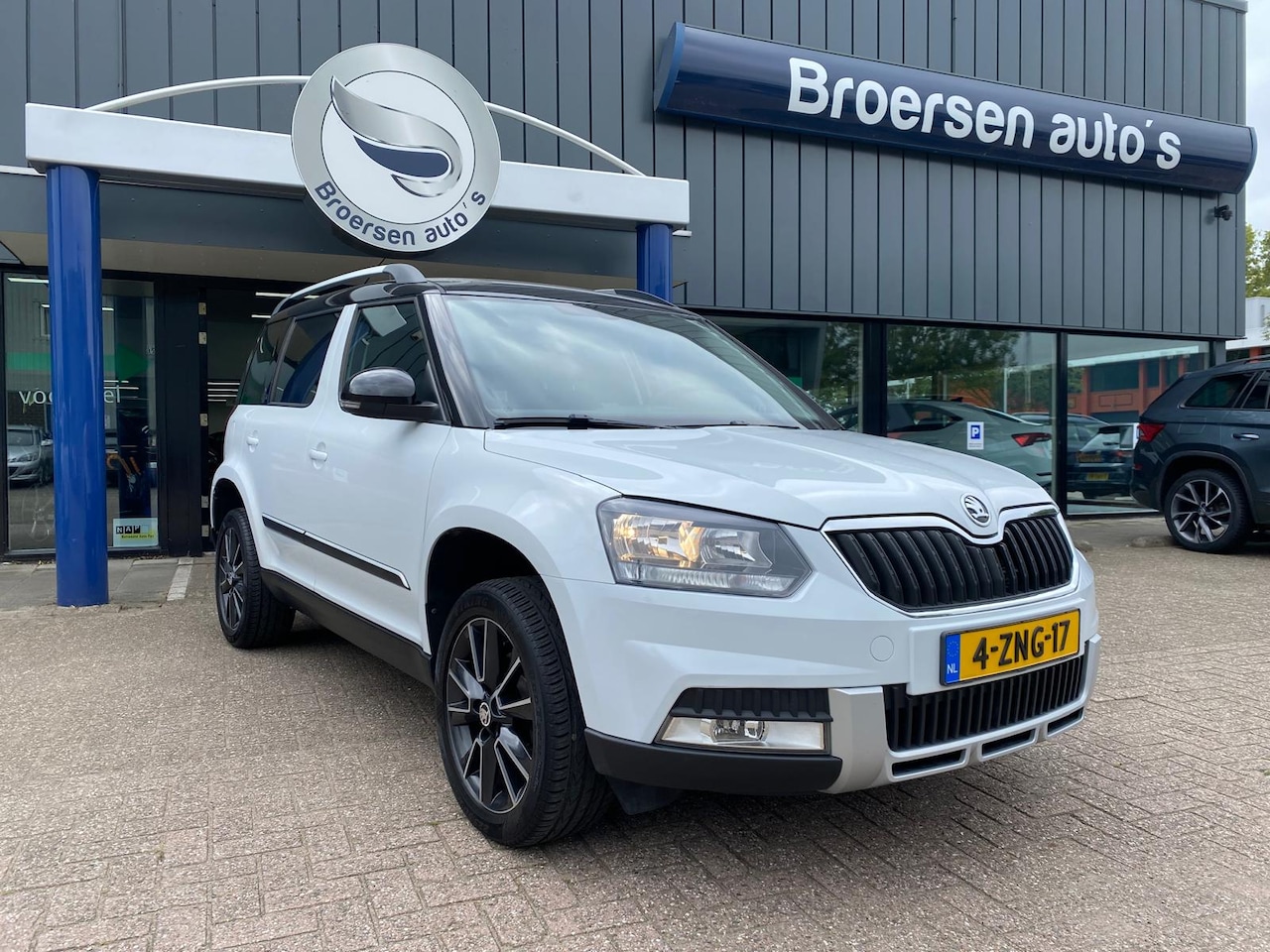 Skoda Yeti - 1.4 TSI 122pk DSG-7 Adventure met Trekhaak, Climatronic en Zwart dak - AutoWereld.nl