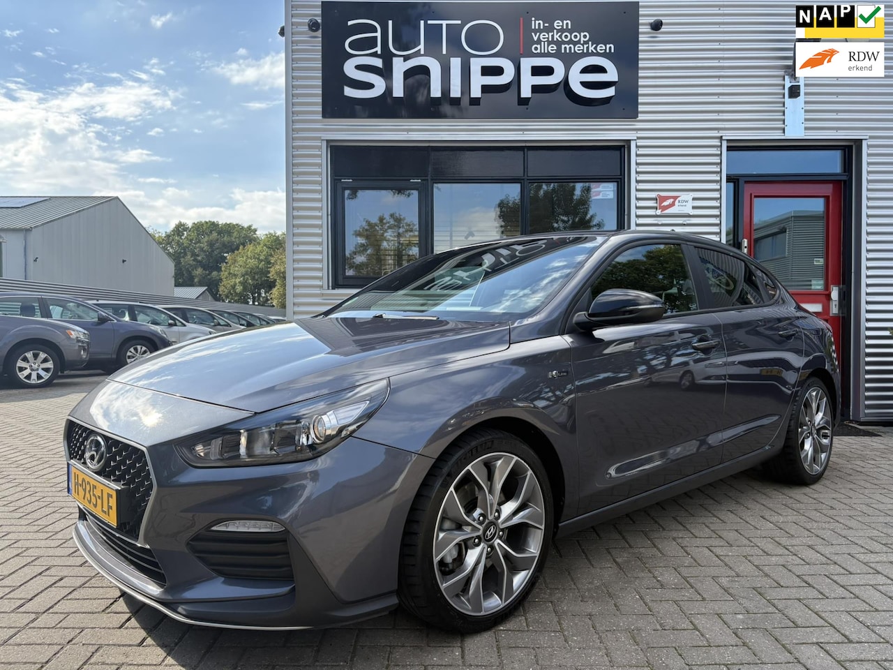 Hyundai i30 Fastback - 1.4 T-GDI N Line -AUTOMAAT-CLIMA-CRUISE-KEYLESS-APPLE CARPLAY/ANDROID AUTO-SPORTSTOELEN-OR - AutoWereld.nl