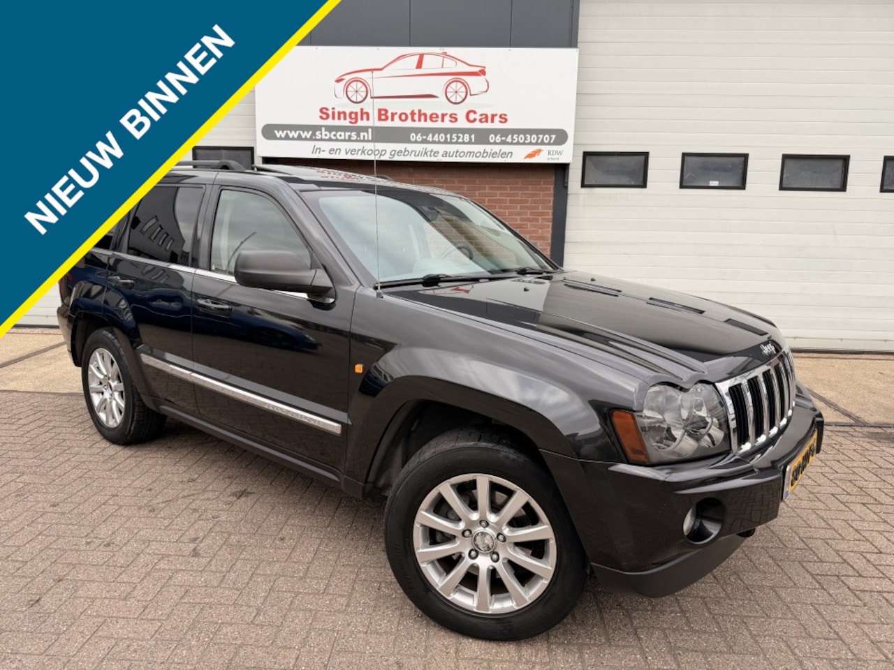 Jeep Grand Cherokee - 5.7 V8 Hemi Limited Aut Navi trekhaak !!!! - AutoWereld.nl