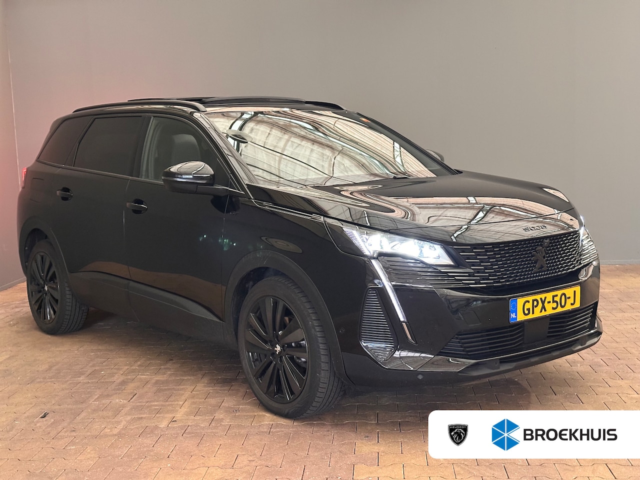Peugeot 5008 - 1.2 Hybrid GT | Panoramadak | Black Pack | Adaptieve Cruise Controle | AGR Stoelen met mas - AutoWereld.nl