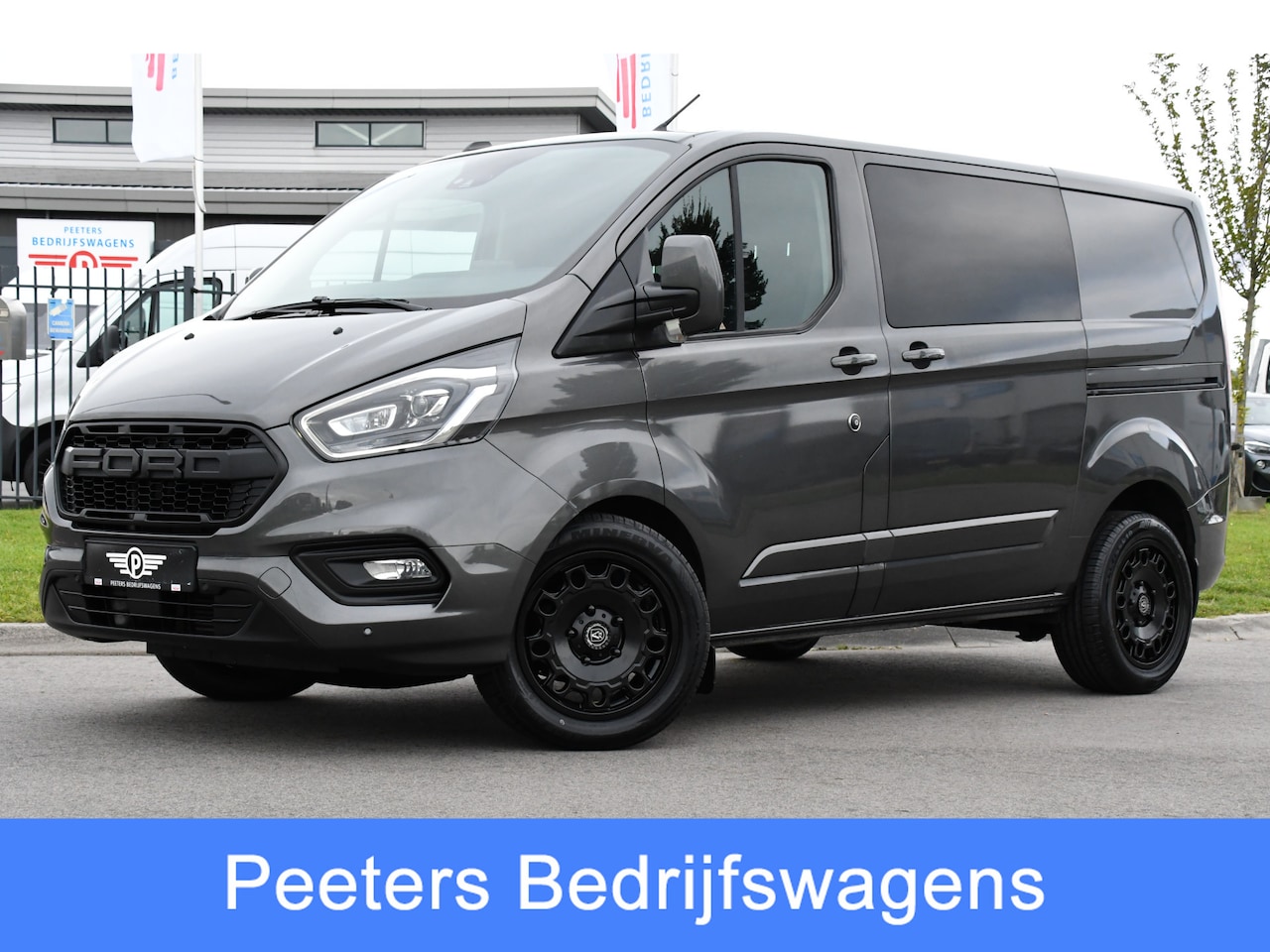 Ford Transit Custom - 300 2.0 TDCI L1H1 DC Limited Raptor Edition Camera, Cruise, 130pk. Automaat, 2 x schuifdeu - AutoWereld.nl
