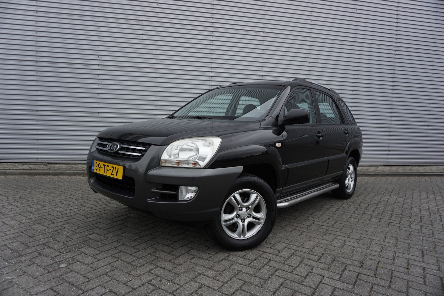 Kia Sportage - 2.0 CVVT Executive Airco / Cruise / Elektr. ramen / Trekhaak / Lm velgen / NAP - AutoWereld.nl