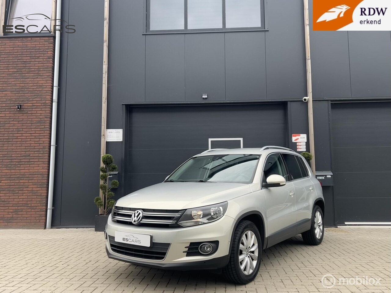 Volkswagen Tiguan - 1.4 TSI Sport&Style Navi | Airco - AutoWereld.nl