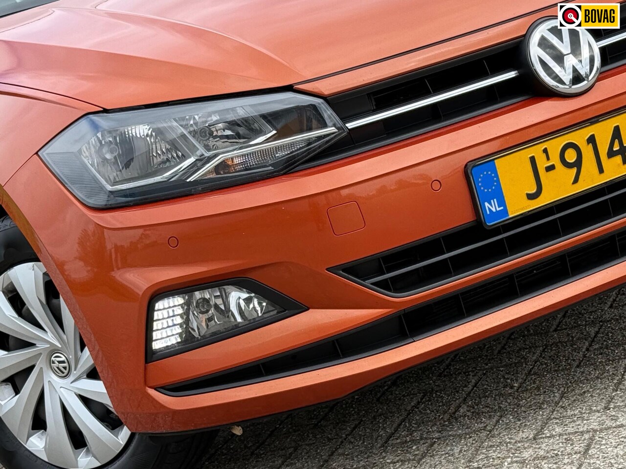 Volkswagen Polo - 1.0 TSI Comfortline Business - Energetic Orange - Carplay/Cruise/Clima - AutoWereld.nl