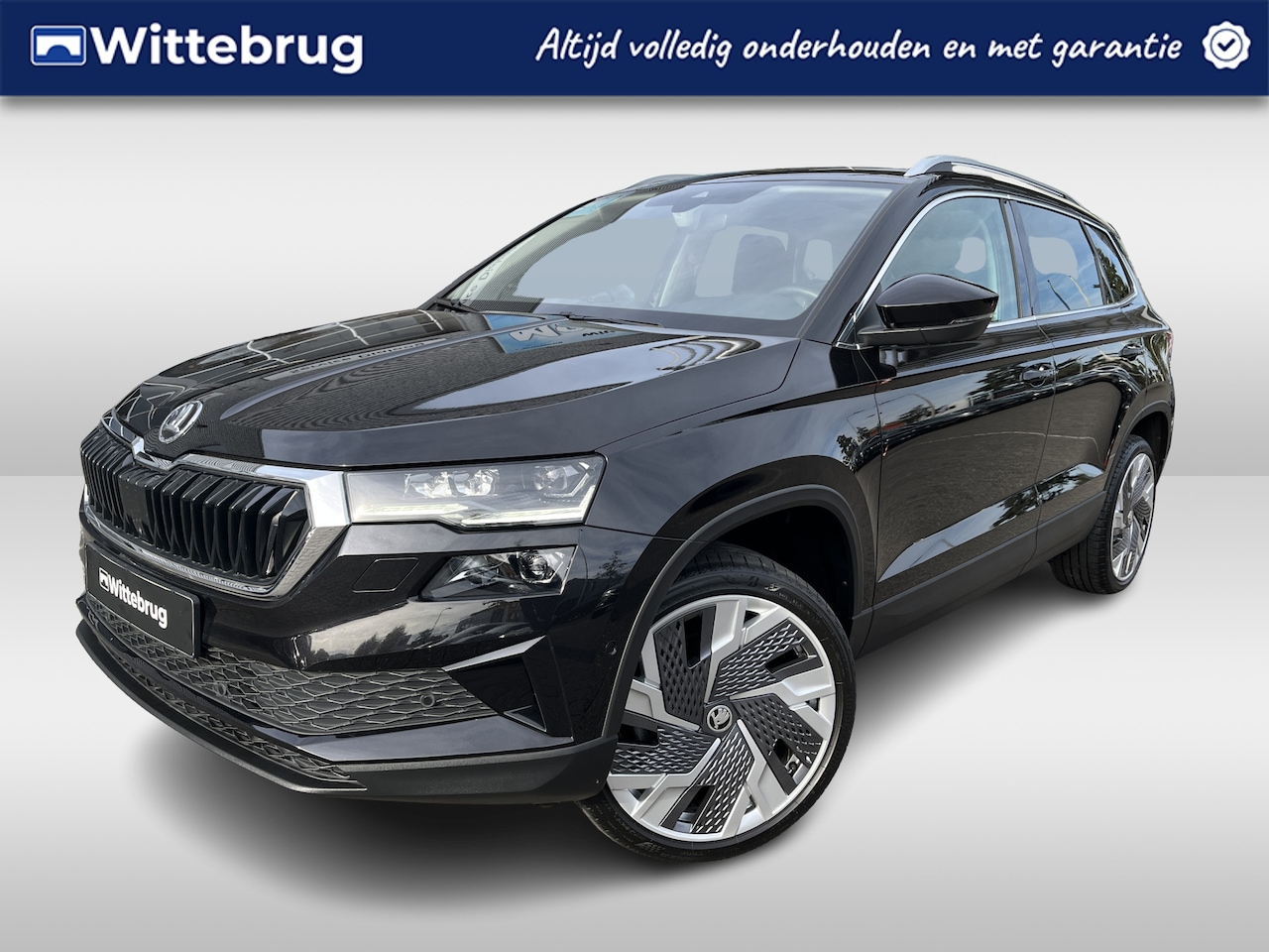 Skoda Karoq - 1.5 TSI ACT Style DSG Automaat 19"LM Velgen / Panoramadak / Leder+ Alcantara / Navigatie / - AutoWereld.nl