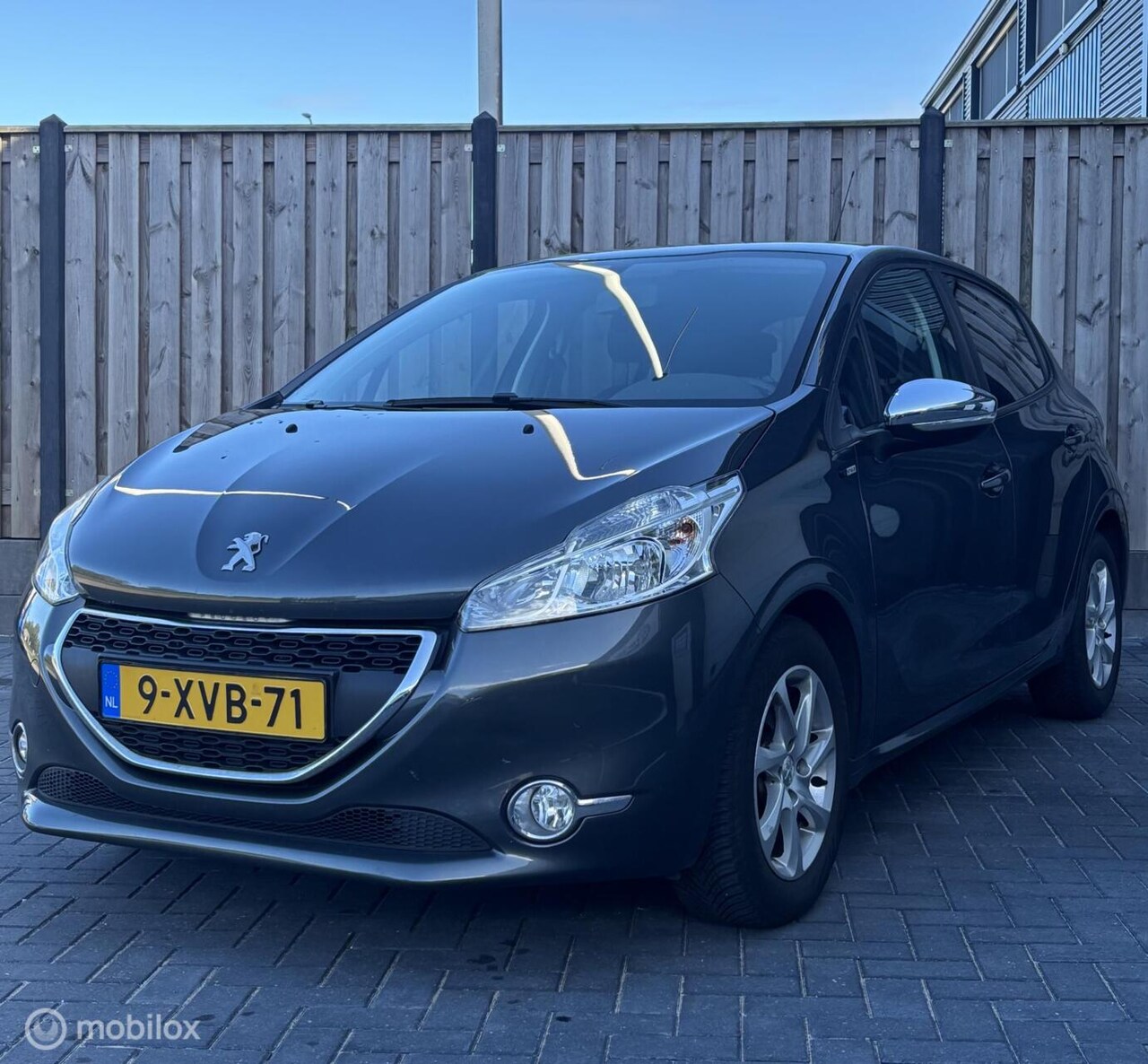 Peugeot 208 - 1.2 VTi Style /NAP/Airco/Navi/Cruise. - AutoWereld.nl
