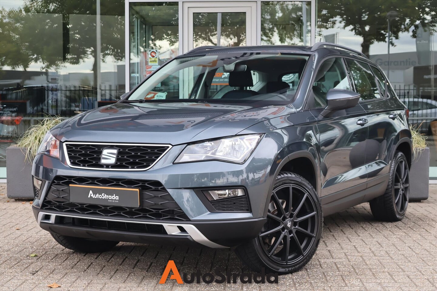 SEAT Ateca - 1.4 Style EcoTSI 150pk | Sensoren | Cruise | Climate | Carplay | Trekhaak - AutoWereld.nl